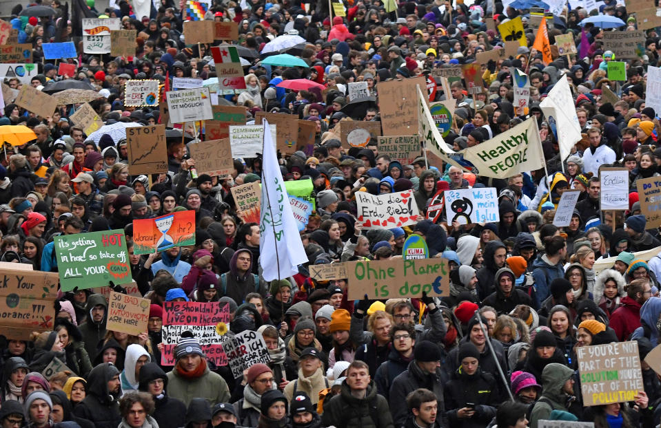 Thousands of demonstrators attend a protest climate strike ralley of the 'Friday For Future Movement' in Leipzig, Germany, Friday, Nov. 29, 2019. Cities all over the world have strikes and demonstrations for the climate during this ClimateActionDay. (AP Photo/Jens Meyer)