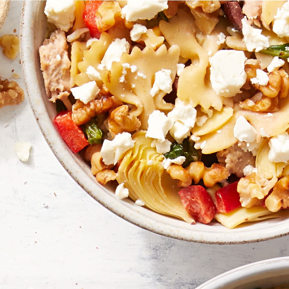 <p>You might not think to use hummus as a pasta sauce, but the creamy dip makes the perfect backdrop to the bold flavors of this healthy Mediterranean-inspired pasta salad.</p>