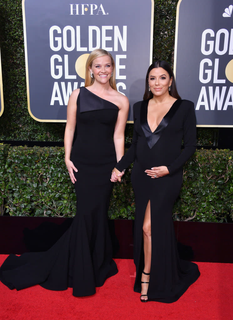 Reese Witherspoon in Zac Posen with Eva Longoria in Genny