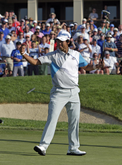 Hideki Matsuyama celebrates after winning the Memorial. (AP)