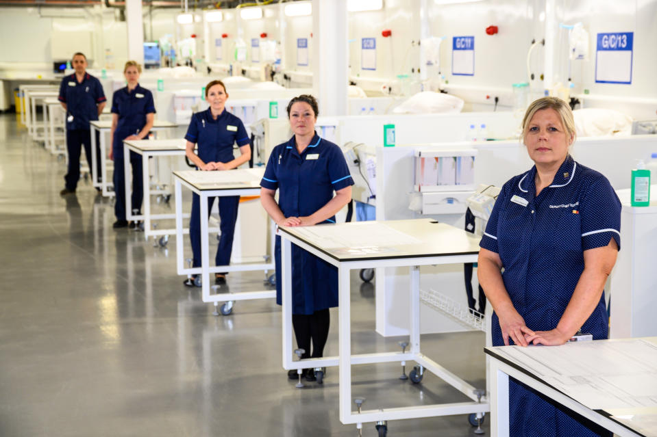 Staff inside NHS Nightingale Hospital Yorkshire and Humber. (PA)