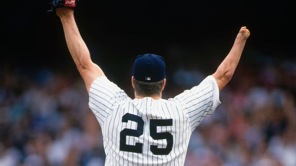 Abbott raises his arms in celebration after pitching a no hitter for the New York Yankees against the Cleveland Indians. - Focus On Sport/Getty Images
