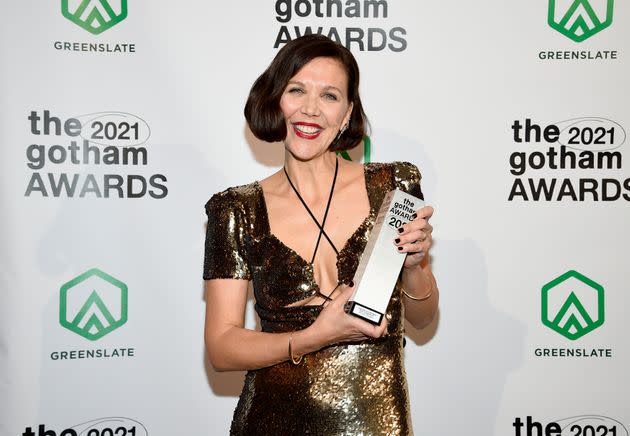 Maggie Gyllenhaal poses with the best screenplay award in the winners room at the Gotham Awards at Cipriani Wall Street on Monday, Nov. 29, 2021, in New York. (Photo by Evan Agostini/Invision/AP) (Photo: via Associated Press)