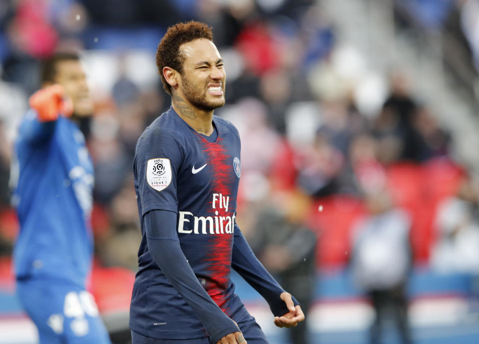 PSG's Neymar reacts after missing a scoring chance during the French League One soccer match between Paris Saint-Germain and Nice at the Parc des Princes stadium in Paris, France, Saturday, May 4, 2019. (AP Photo/Christophe Ena)