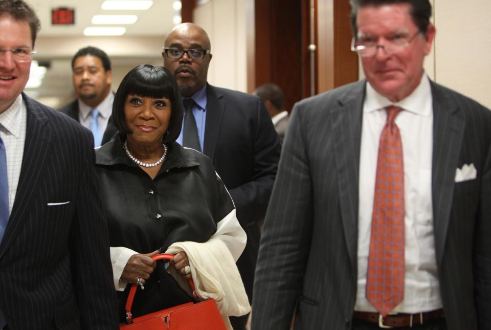 Singer Patti LaBelle walks out of the courtroom after testifying on the witness stand at the Harris County Criminal Courthouse for the lawsuit against her bodyguards on Thursday, Nov. 7, 2013, in Houston. LaBelle told a Houston court Thursday that Richard King scared her in 2011 when he staggered toward her limousine at George Bush Intercontinental Airport. LaBelle's bodyguard, Efrem Holmes, is charged with misdemeanor assault in the clash caught on security video that landed King in a hospital with a head wound. Records show King's blood alcohol level was more than three times the legal limit for driving. King testified Thursday that he could not remember details of the incident. King has also filed a civil lawsuit against the singer and Holmes. LaBelle has countersued.(AP Photo/Houston Chronicle, Mayra Beltran)