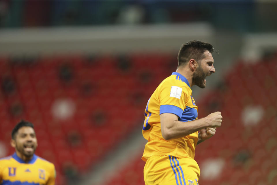 André-Pierre Gignac celebra tras anotar un gol para Tigres en el partido contra Ulsan Hyundai por el Mundial de clubes en Al Rayyan, Catar, el jueves 4 de febrero de 2021. (AP Foto/Hussein Sayed)