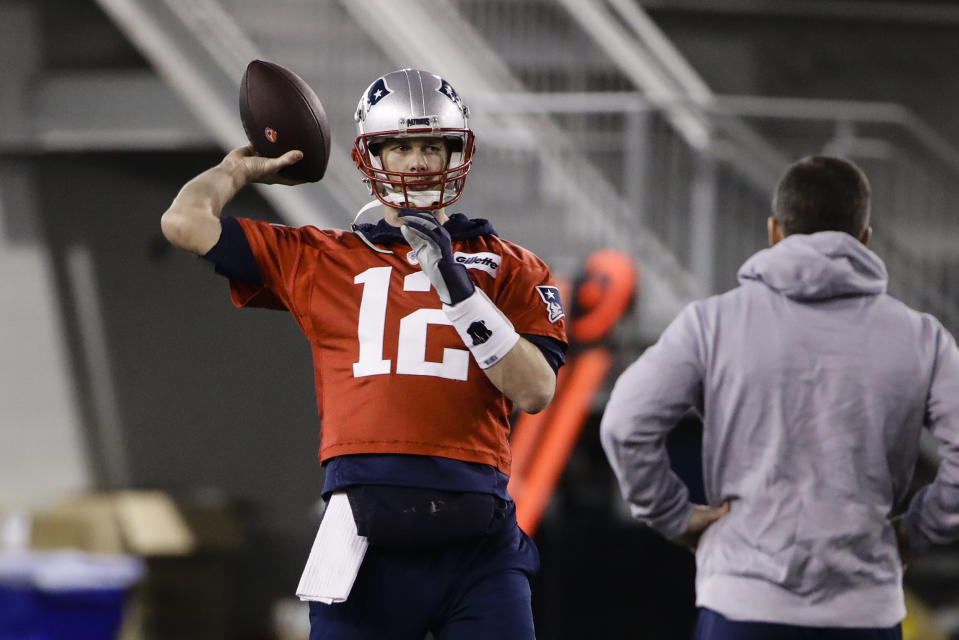 New England Patriots quarterback Tom Brady throws a pass during NFL football practice, Friday, Feb. 1, 2019, in Atlanta, as the team prepares for Super Bowl 53 against the Los Angeles Rams. (AP Photo/Matt Rourke)