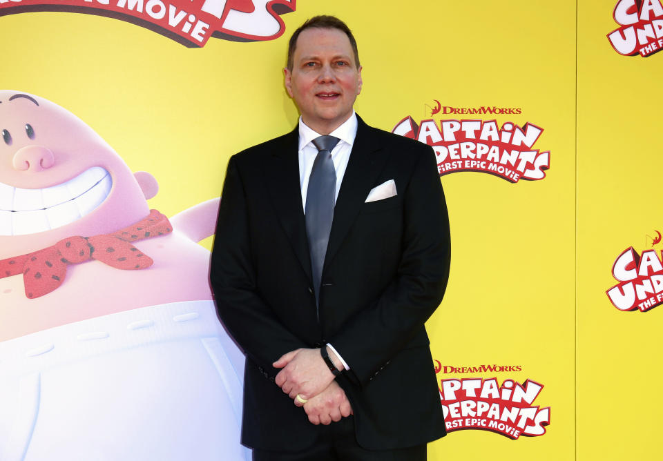 FILE - Dav Pilkey arrives at the premiere of "Captain Underpants: The First Epic Movie" in Los Angeles on May 21, 2017. A graphic novel for children from the wildly popular “Captain Underpants” series, “The Adventures of Ook and Glu," is being pulled from library and book store shelves after its publisher said it “perpetuates passive racism.” (Photo by Willy Sanjuan/Invision/AP, File)