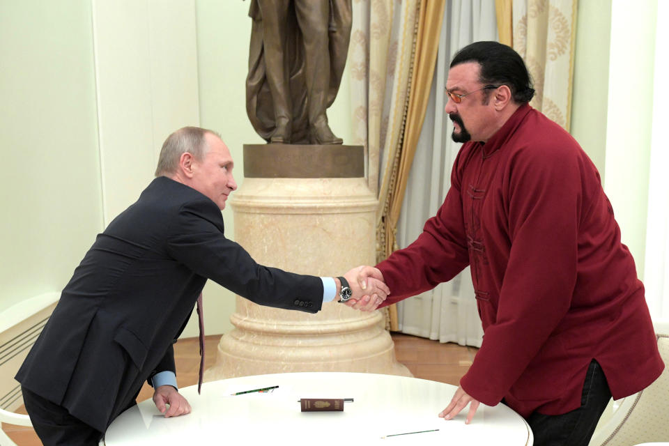 Russia's President Vladimir Putin granted Steven Seagal, whose father was Russian, Russian citizenship in November 2016. (Photo: Sputnik Photo Agency / Reuters)