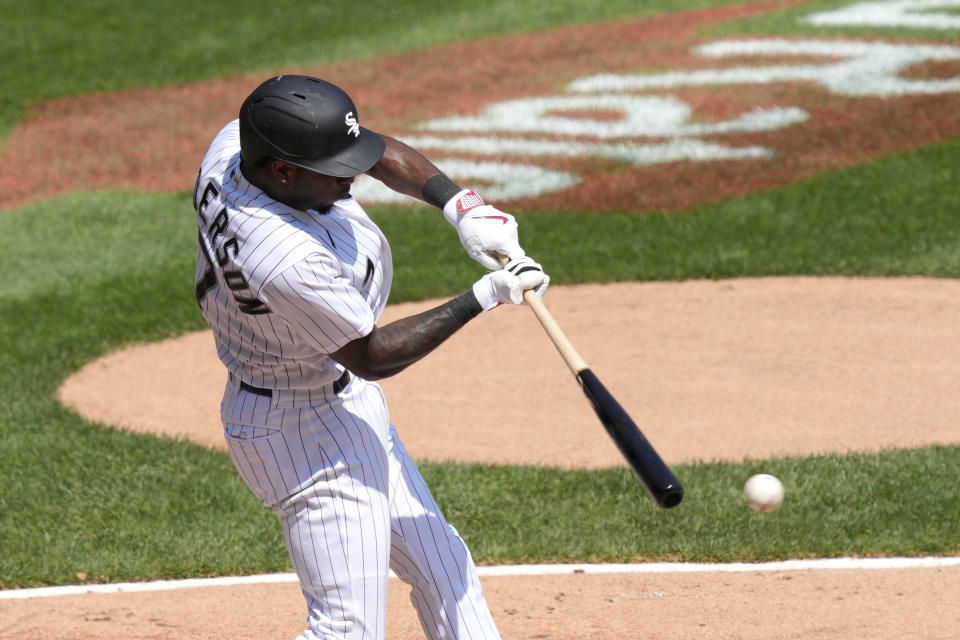 Chicago White Sox' Tim Anderson hits an RBI single off Seattle Mariners starting pitcher George Kirby during the third inning of a baseball game Wednesday, Aug. 23, 2023, in Chicago. (AP Photo/Charles Rex Arbogast)