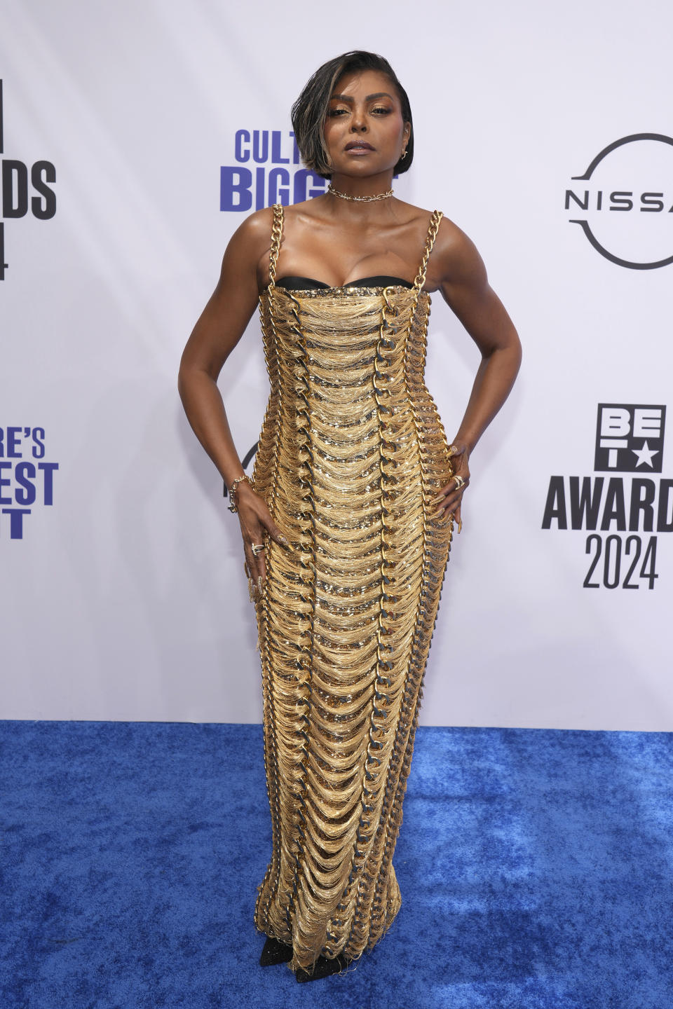 Taraji P. Henson wore an all-gold Balmain dress to arrive at the BET Awards on June 30 at the Peacock Theater in Los Angeles. (Photo by Jordan Strauss/Invision/AP)