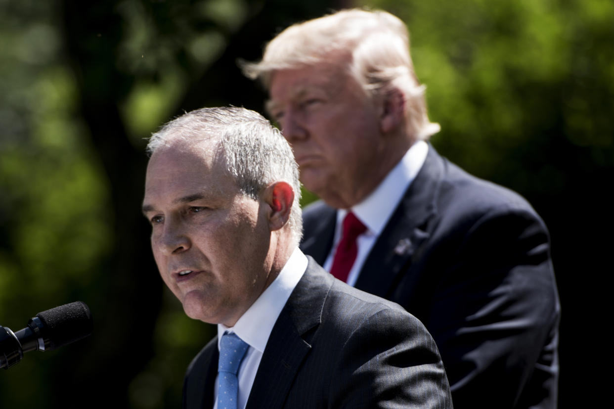 Both Environmental Protection Agency Administrator Scott Pruitt (left) and President Donald Trump are vocal climate change deniers. Pruitt has said the debate on climate&nbsp;change is "far from settled." Trump has famously described global warming&nbsp;as a myth perpetuated by China.&nbsp; (Photo: BRENDAN SMIALOWSKI/Getty Images)