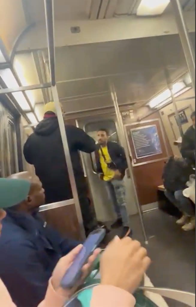 The video showed one man provoking another before at least four gunshots rang out on the crowded train.