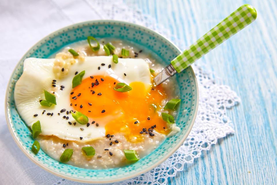 Savory oatmeal with cheese, fried egg and green onion