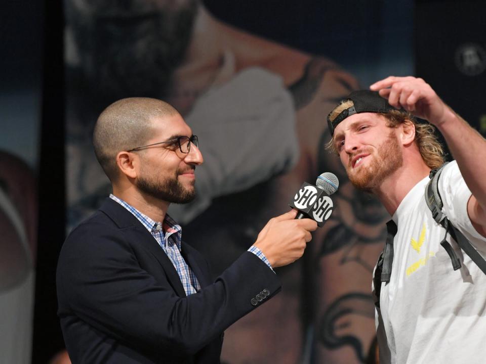 Helwani (left) speaking with Logan Paul in 2021 (Getty Images)