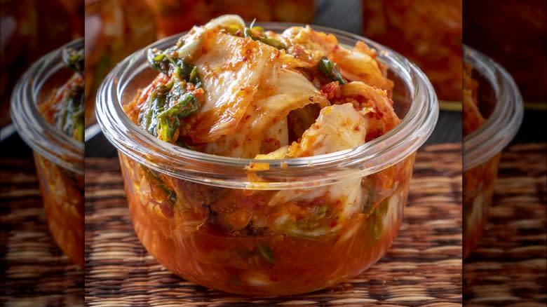 Glass container with kimchi