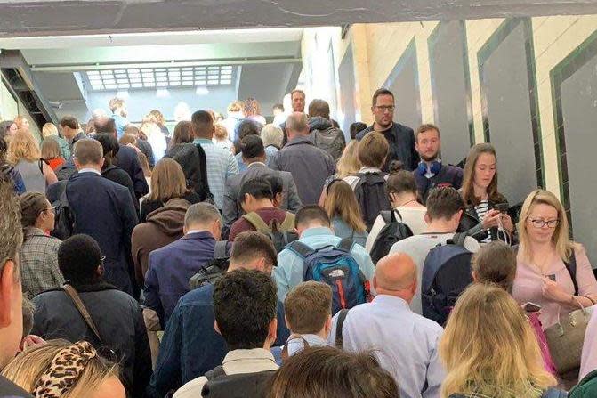 A huge queue to get onto the platform at Surbiton station (@leftforbed/Twitter)