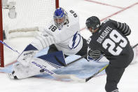 Tampa Bay Lightning goalie Andrei Vasilevskiy (88) blocks a shot by Edmonton Oilers forward Leon Draisaitl (29) in the NHL hockey All Star final game Saturday, Jan. 25, 2020, in St. Louis. (AP Photo/Scott Kane)