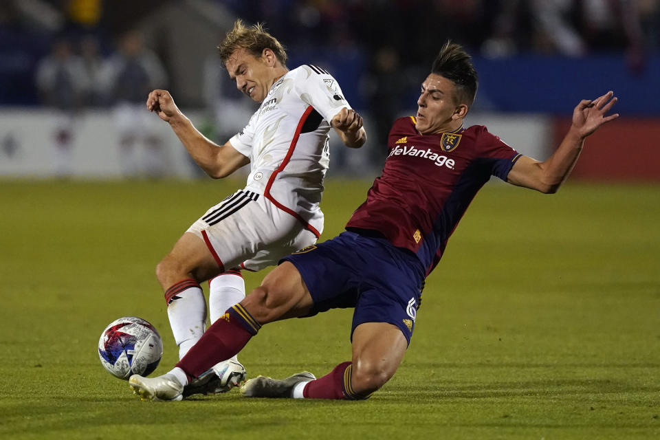Real Salt Lake midfielder Braian Ojeda (6) and FC Dallas midfielder Paxton Pomykal, left, vie for control of the ball during the second half of an MLS soccer match Saturday, April 15, 2023, in Frisco, Texas. (AP Photo/LM Otero)