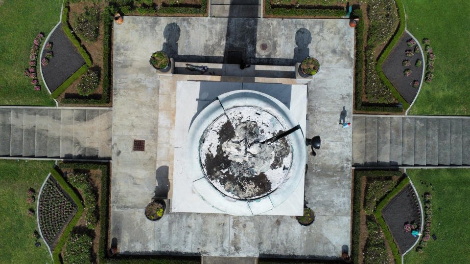 The top of the empty pedestal where a statue of Confederate General Robert E. Lee once stood is seen at the traffic circle at St. Charles Ave. and Howard Ave. in New Orleans, La., Thursday, April 21, 2022. (Max Becherer/The Times-Picayune/The New Orleans Advocate via AP)