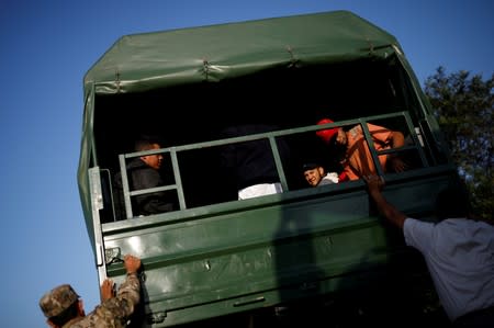 FILE PHOTO: Venezuelans at the Ecuadorian Peruvian border service center on the outskirts of Tumbes