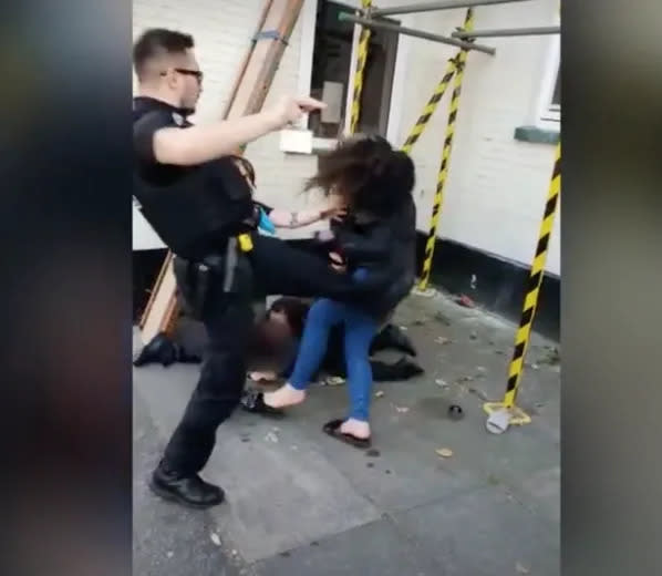 The officer was filmed kicking the girl in the waist in the incident in Norwich. (SWNS)