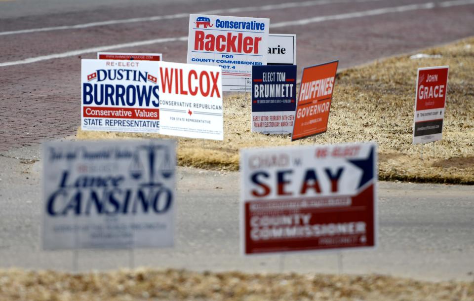 Signs are seen in front of Broadway Church of Christ on Election Day, Tuessday, March 1, 2022. Polls are open from 7 a.m. to 7 p.m.