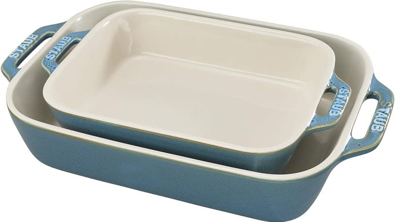 Two blue and white rectangular pans