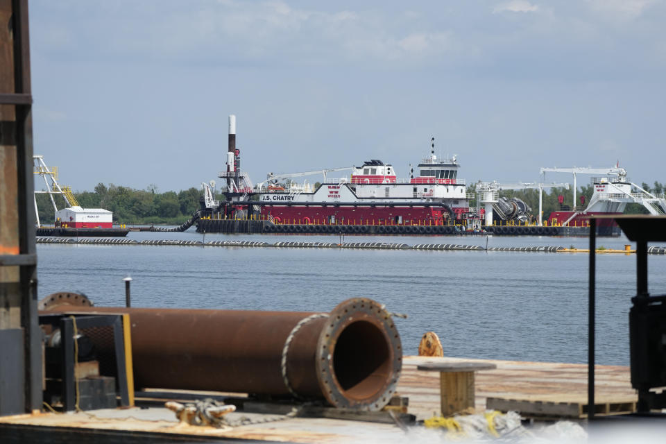 Work in the Mississippi River is seen where sills are being made to help limit salt water intrusion that is progressing upriver due to the unusually low water level in the river in Plaquemines Parish, La., Monday, Sept. 25, 2023. (AP Photo/Gerald Herbert)