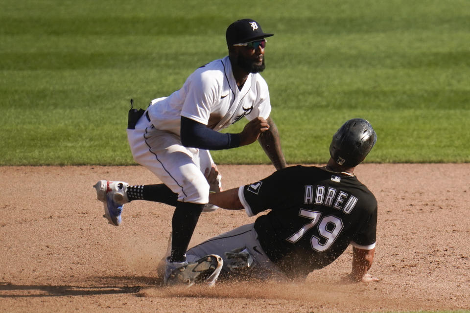 Detroit Tigers shortstop Niko Goodrum tags Chicago White Sox's Jose Abreu (79) out at second base in the ninth inning of a baseball game in Detroit, Monday, Sept. 27, 2021. (AP Photo/Paul Sancya)