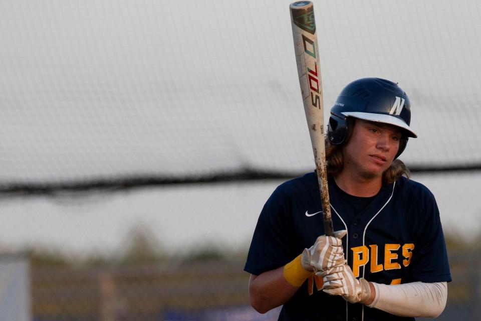 Naples' Brendan Carr (4) reacts during the top of the third inning of the FHSAA Class 5A-District 14 baseball championship between Naples High School and Barron Collier High School, Thursday, May 5, 2022, at Barron Collier High School in Naples, Fla.Barron Collier defeated Naples 5-1 to win the Class 5A-District 14 title.