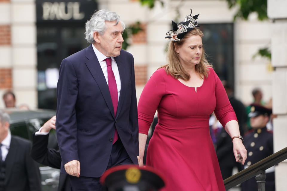Gordon Brown's wife Sarah also opted for a berry pink ensemble. (Getty Images)