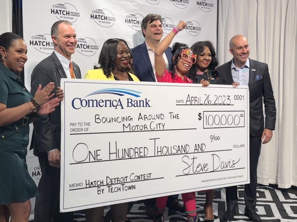 Cathryn Coleman, owner of Bouncing Around The Motor City, celebrates winning $100,000 during the 2023 Comerica Hatch Off pitch competition.