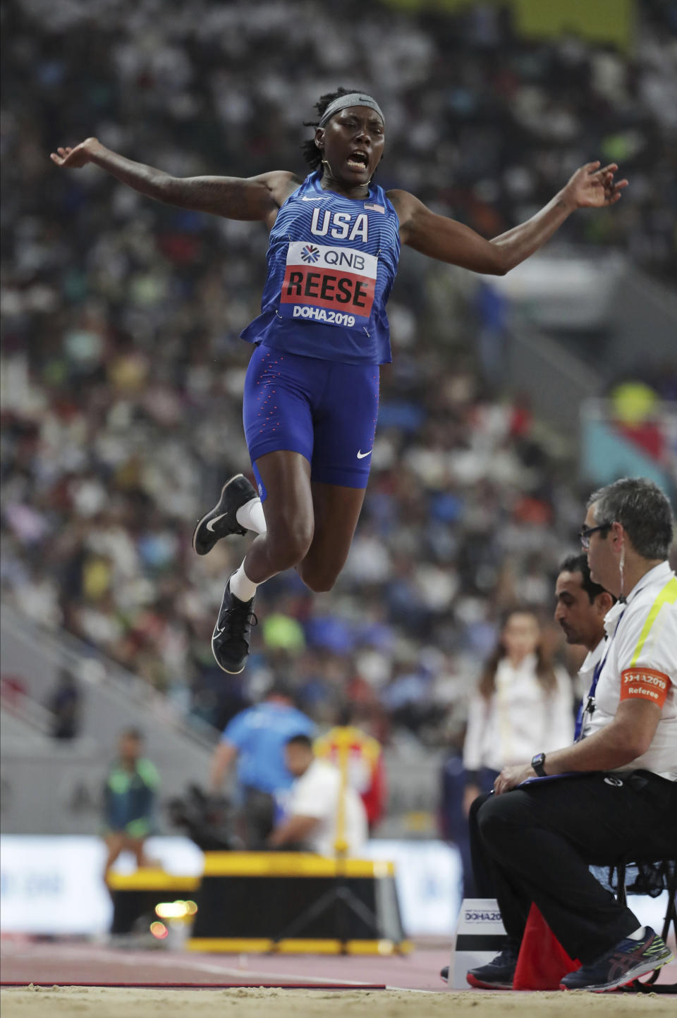 Brittney Reese, of the United States, competes in the women's long jump qualification at the World Athletics Championships in Doha, Qatar, Saturday, Oct. 5, 2019. (AP Photo/Hassan Ammar)