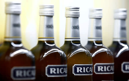 FILE PHOTO: Bottles of the Ricard aniseed-flavoured beverage displayed during French drinks maker Pernod Ricard's news conference to announce annual results in Paris, France, August 29, 2018. REUTERS/Christian Hartmann/File Photo