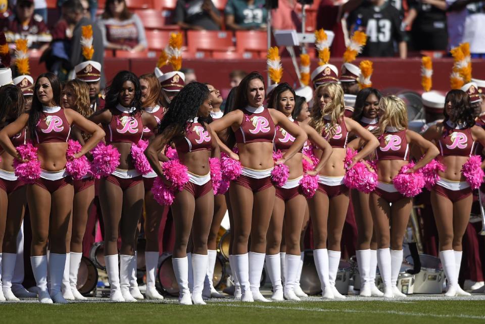 <p>Washington Redskins cheerleaders stand on the field in the first half of an NFL football game between the Redskins and the Philadelphia Eagles, Sunday, Oct. 16, 2016, in Landover, Md. (AP Photo/Nick Wass) </p>