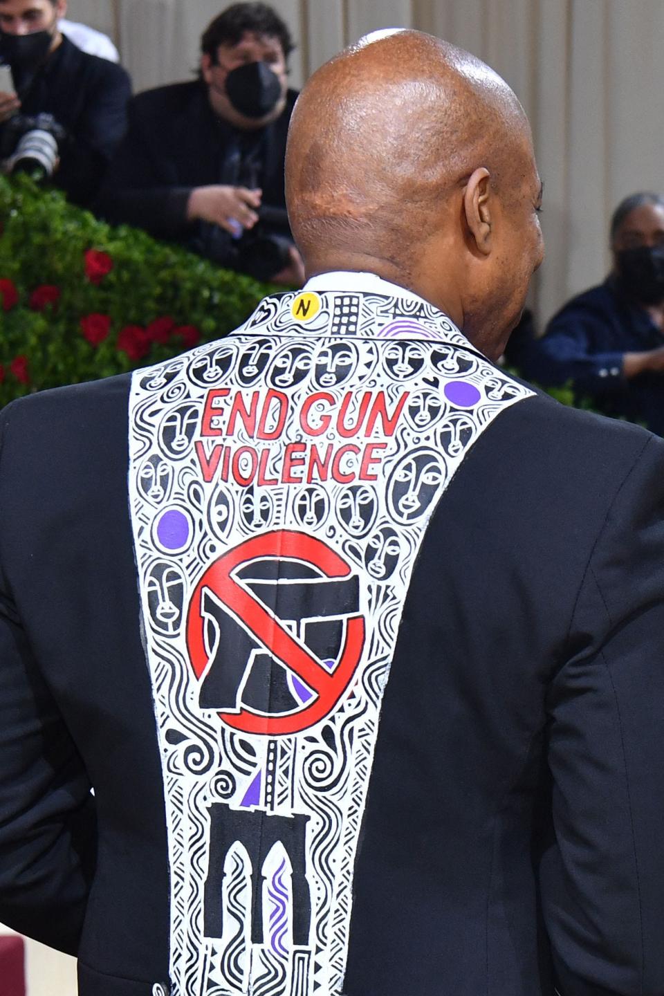 New York City Mayor Eric Adams, wearing a jacket with "End Gun Violence", arrives for the 2022 Met Gala at the Metropolitan Museum of Art.