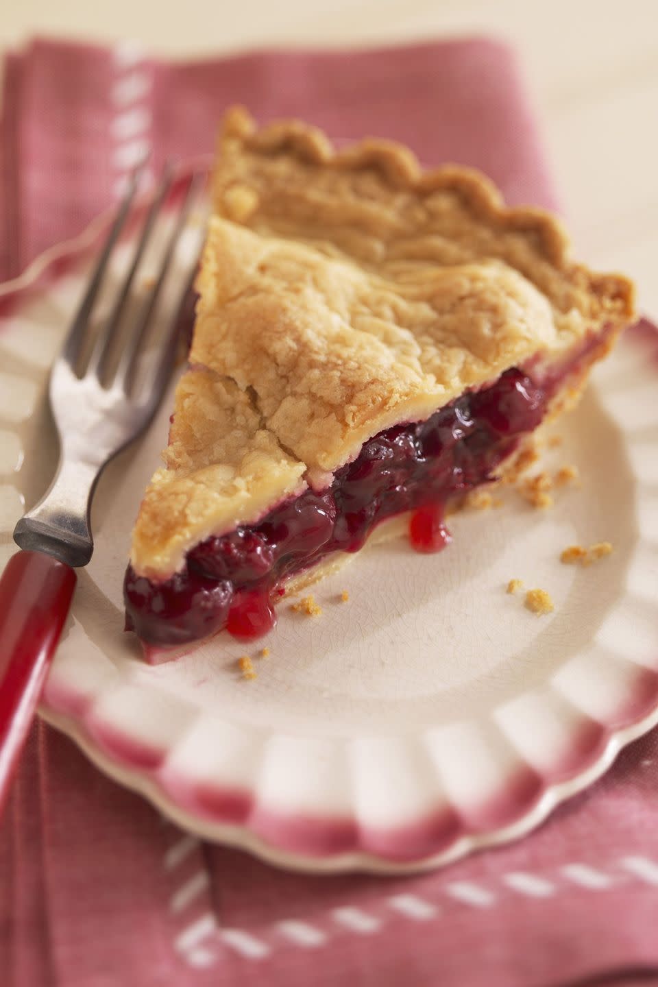 a slice of farmstand cherry pie with a double crust