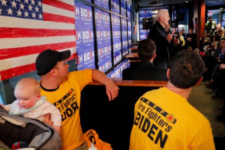 "IAAF Firefighters for Biden" listen as Democratic 2020 U.S. presidential candidate Biden speaks in Hampton