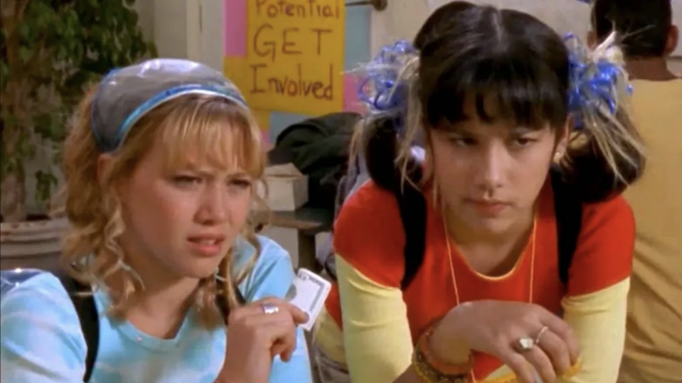 Lizzie McGuire and Miranda Sanchez look concerned in a scene from the show "Lizzie McGuire."