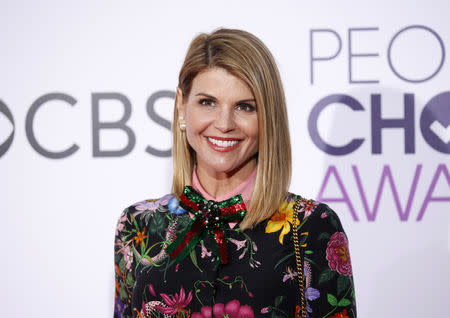 FILE PHOTO: Actress Lori Loughlin arrives at the People's Choice Awards 2017 in Los Angeles, California, U.S., January 18, 2017. REUTERS/Danny Moloshok