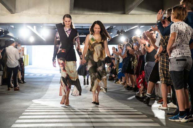 Jiexian Huang walks the SCAD Fashion show finale with her model. Photo: Courtesy of SCAD