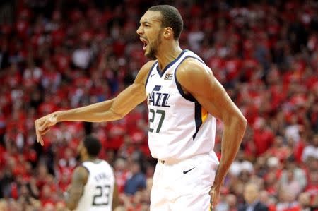 Apr 24, 2019; Houston, TX, USA; Utah Jazz center Rudy Gobert (27) protests a foul call against the Houston Rockets during the fourth quarter in game five of the first round of the 2019 NBA Playoffs at Toyota Center. Mandatory Credit: Erik Williams-USA TODAY Sports