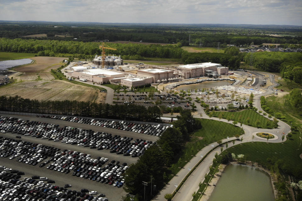 This aerial image taken with a drone shows the BAPS Shri Swaminarayan Mandir in Robbinsville Township, N.J., Tuesday, May 11, 2021. Workers from marginalized communities in India were lured to the U.S. and forced to work long hours for just a few dollars per day to help build the Hindu temple in New Jersey, according to a lawsuit filed Tuesday, May 11, 2021. The lawsuit filed in federal court accuses the leaders of the Hindu organization known as Bochasanwasi Akshar Purushottam Swaminarayan Sanstha, or BAPS, of human trafficking and wage law violations. (AP Photo/Ted Shaffrey)