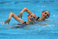 LONDON, ENGLAND - AUGUST 07: Natalia Ishenko and Svetlana Romashina of Russia compete in the Women's Duets Synchronised Swimming Free Routine Final on Day 11 of the London 2012 Olympic Games at the Aquatics Centre on August 7, 2012 in London, England. (Photo by Clive Rose/Getty Images)
