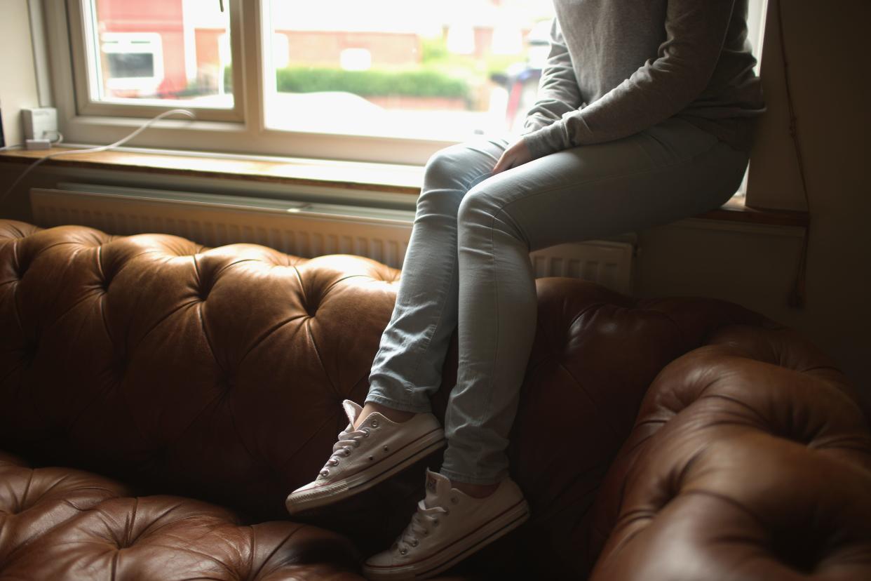 Photo illustration showing a teenage girl, who claims to be a victim of sexual abuse and alleged grooming, poses in Rotherham on September 3, 2014 in Rotherham, England.