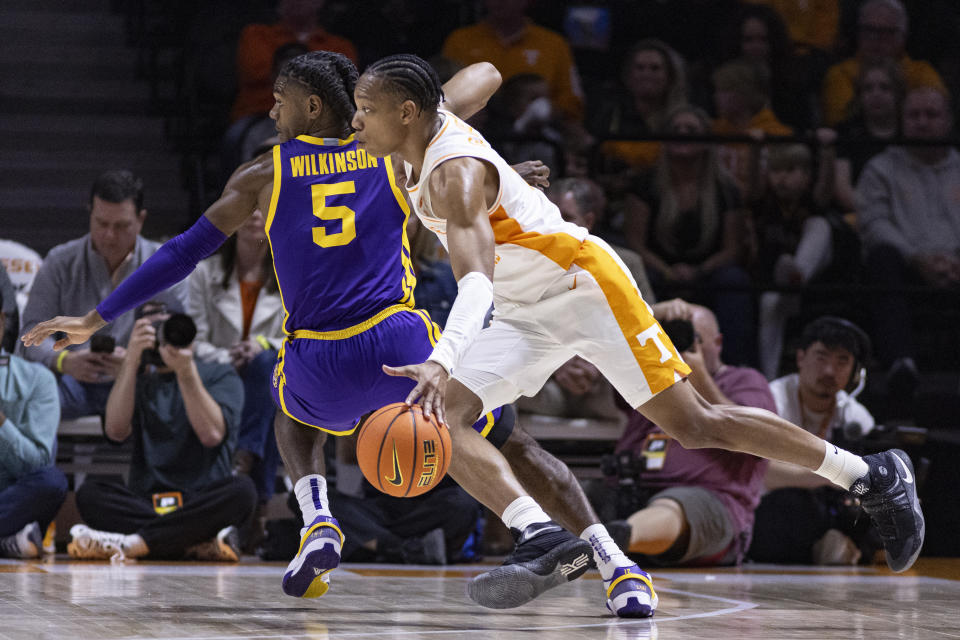 Tennessee guard Jordan Gainey drives around LSU forward Mwani Wilkinson (5) during the second half of an NCAA college basketball game Wednesday, Feb. 7, 2024, in Knoxville, Tenn. (AP Photo/Wade Payne)