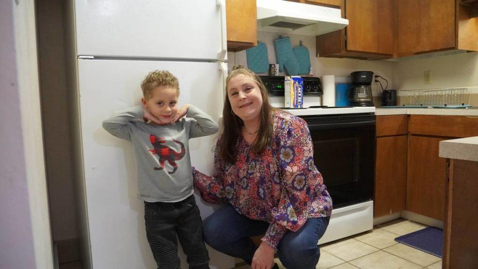 Isaiah, left, and Heidi spend time together in their Boise Rescue Mission apartment in Nampa. The mission runs dozens of apartments for people exiting homelessness in the Treasure Valley.
