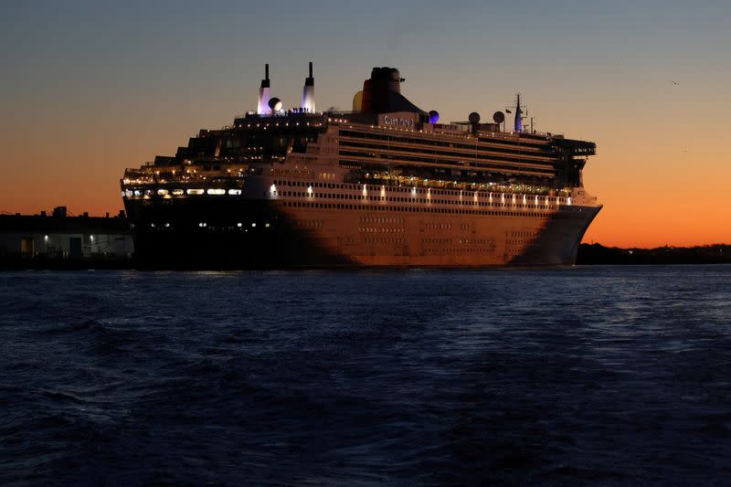 FILE PHOTO: The Queen Mary 2 cruise ship by Cunard Line, owned by Carnival Corporation & plc. is seen docked at Brooklyn Cruise Terminal