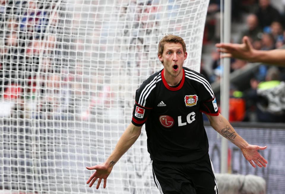 Leverkusen's Stefan Kiessling celebrates after scoring during the German first division Bundesliga soccer match between Bayer Leverkusen and Hertha BSC Berlin in Leverkusen, Germany, Sunday April 13,2014. (AP Photo/Rolf Vennenbernd/dpa)